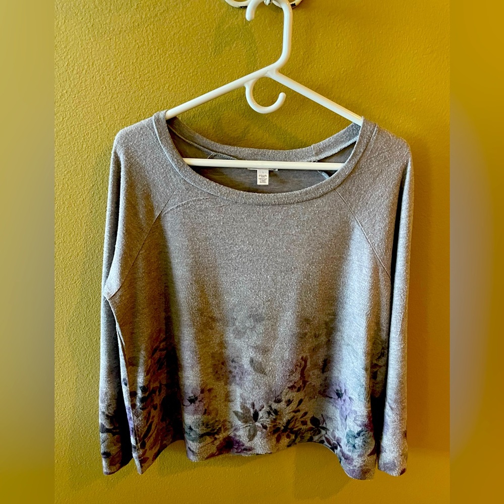 So soft, sure to be your go to for comfort, grey knit with floral along bottom.